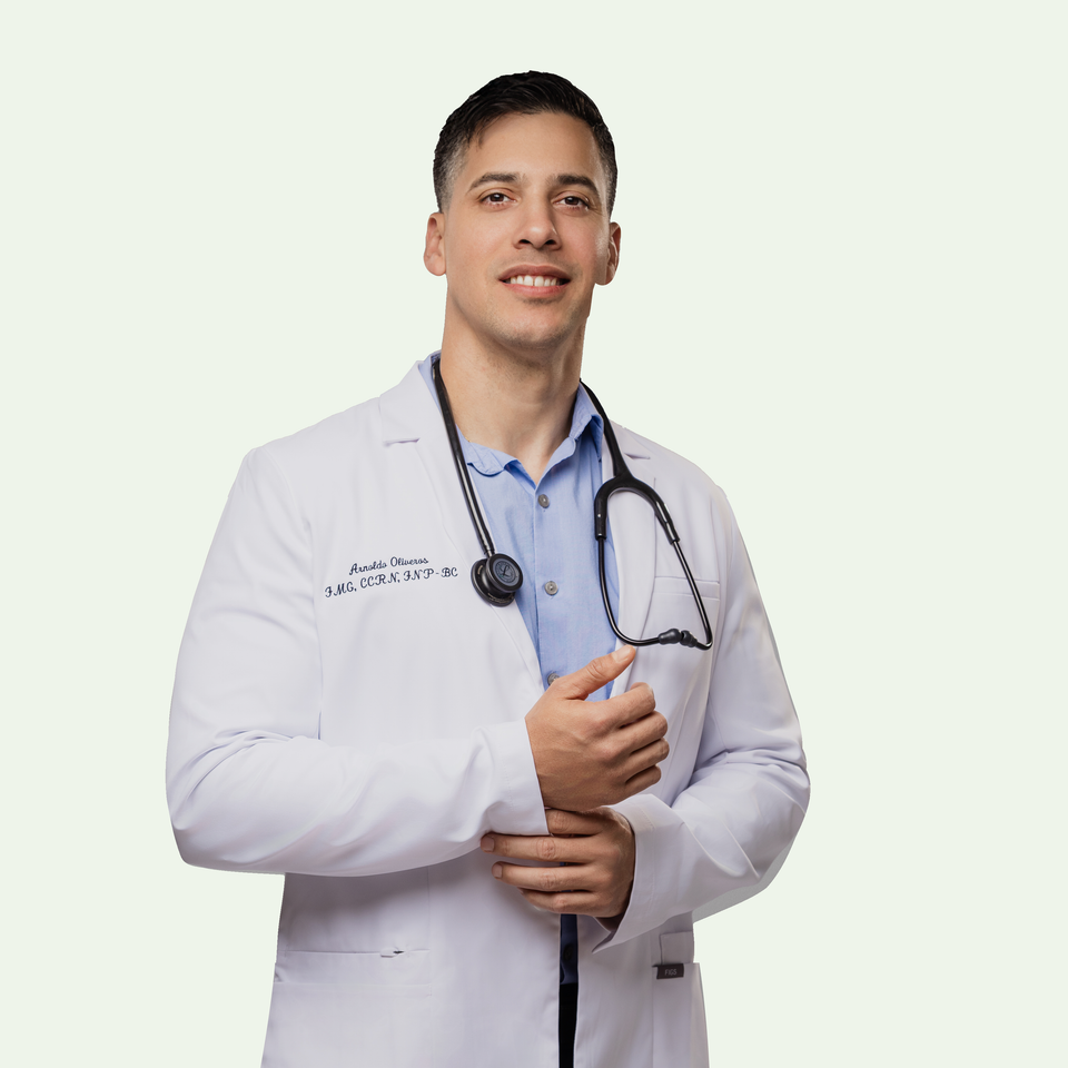 Arnoldo Oliveros Lopez in a white coat with a stethoscope